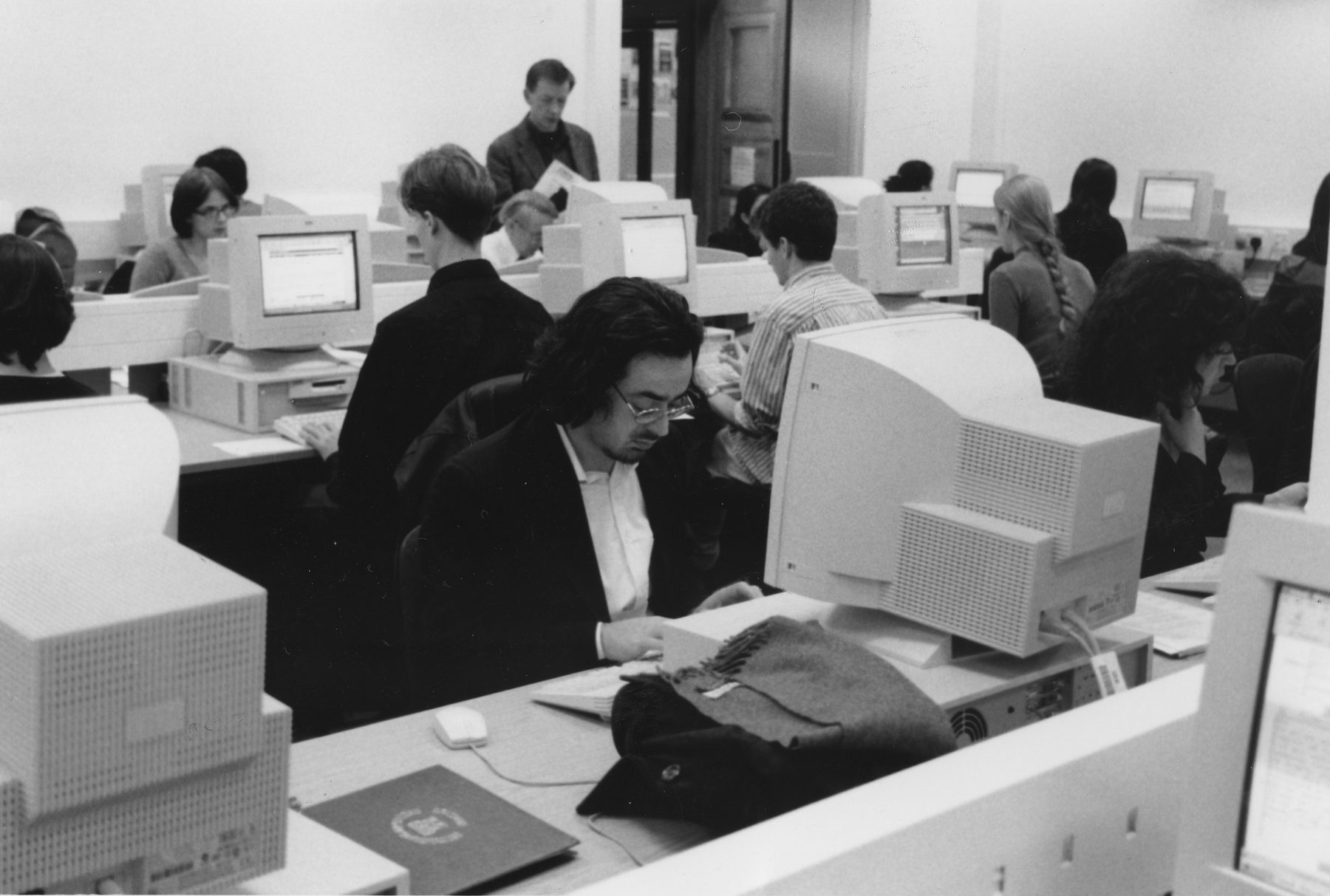 Students at individual computer workstations at the London School of Economics, circa the 1990s.